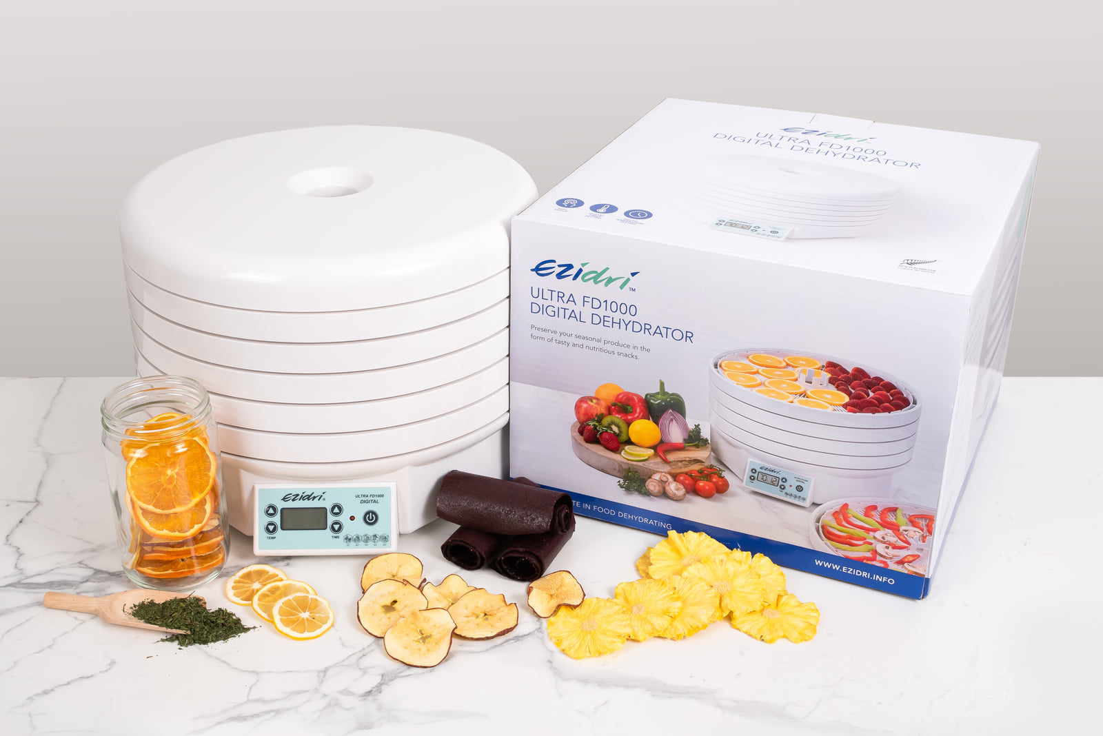 Ezidri food dehydrator with jars of dried fruit